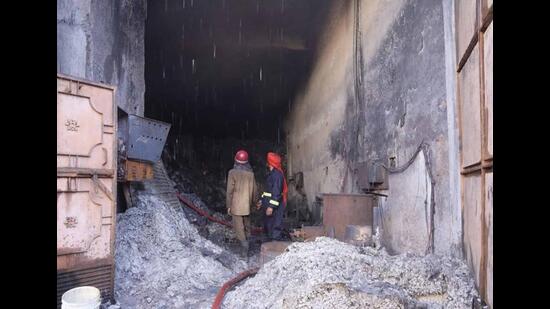 Nine fire tenders were rushed to the spot, and the fire fighting operation continued for around five hours. (HT Photo)