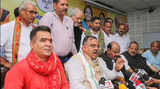 BJP national general secretary Tarun Chugh addresses the media after former PDP leader Surinder Choudhary and others join the party in Jammu on Tuesday. (PTI)
