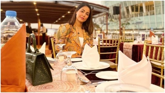 On Monday, Hina took to Instagram to share another set of photos from Dubai. They show her posing on the Dubai streets for a photoshoot and enjoying a cruise date with her mother and Rocky. The star captioned her post, "Cruising does the Soul good...Sunsets, Open air, Amazing dinner and much much more."(Instagram/@realhinakhan)
