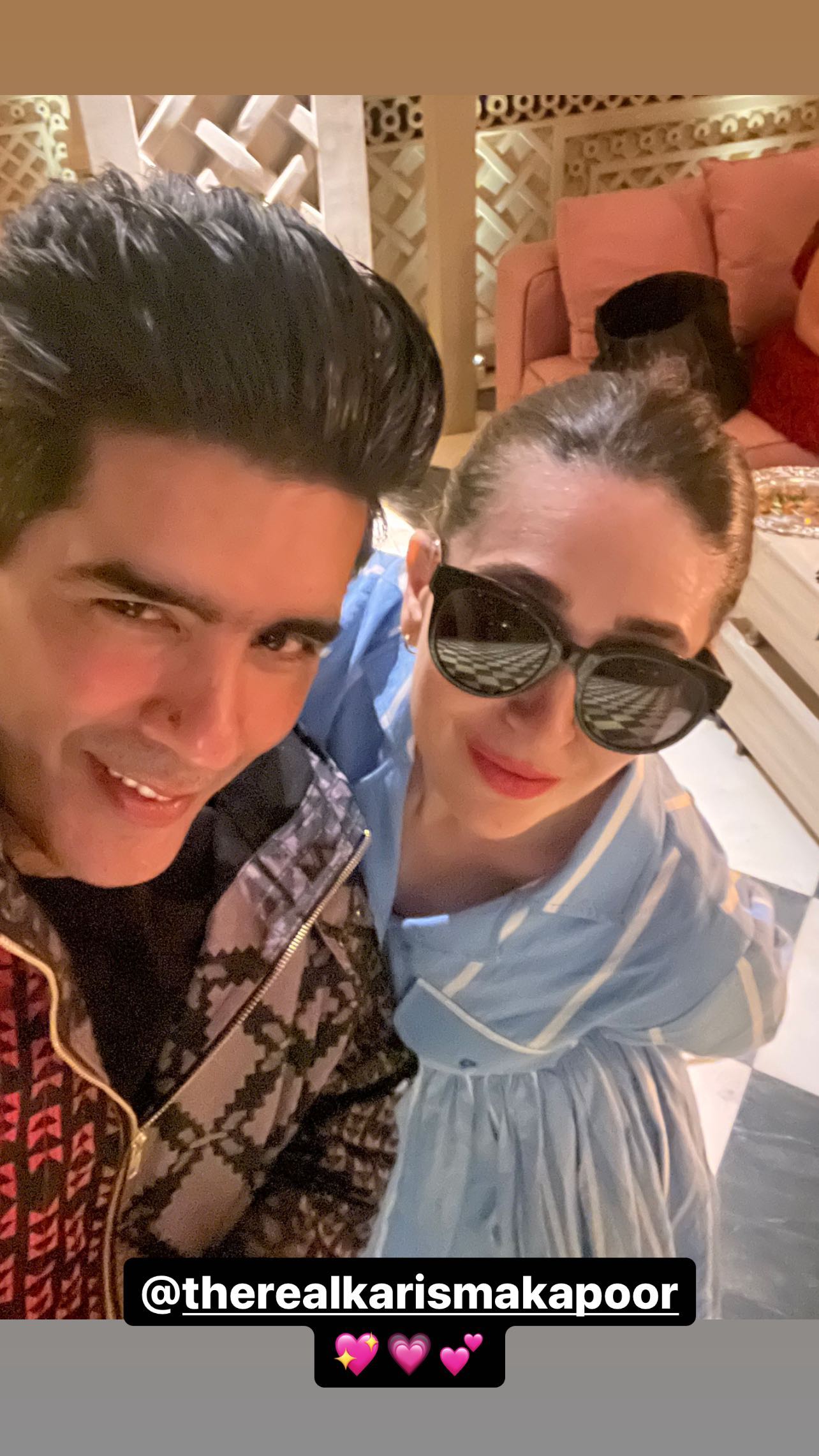 Manish Malhotra poses with Karisma Kapoor.