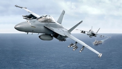 A US F 18 fighter taking off from American aircraft carrier. A US F 18 fighter taking off from American aircraft carrier.