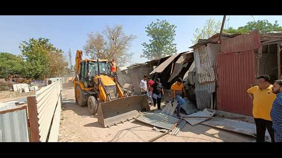 The anti-encroachment drive being carried out at the Dhanas marble market in Chandigarh on Wednesday. (HT Photo)