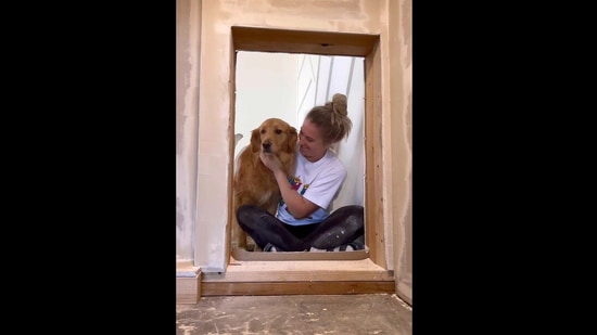 The woman and her dog in the bedroom she built for it.&nbsp;(reddit/@IllustriousPresent7)