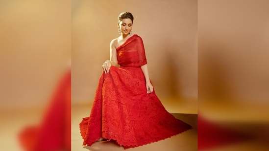 Parineeti Chopra is the perfect personification of love in this red gown which she teamed with statement pearl earrings.(Instagram/@parineetichopra)