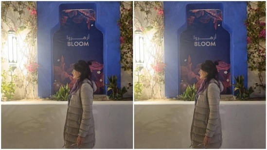 For her first night out in Aqaba, Kirti chose to slay winter fashion in a monochrome sweater and a pair of denims with wide legs. She posed by a quote that read “Bloom.”(Instagram/@iamkirtikulhari)