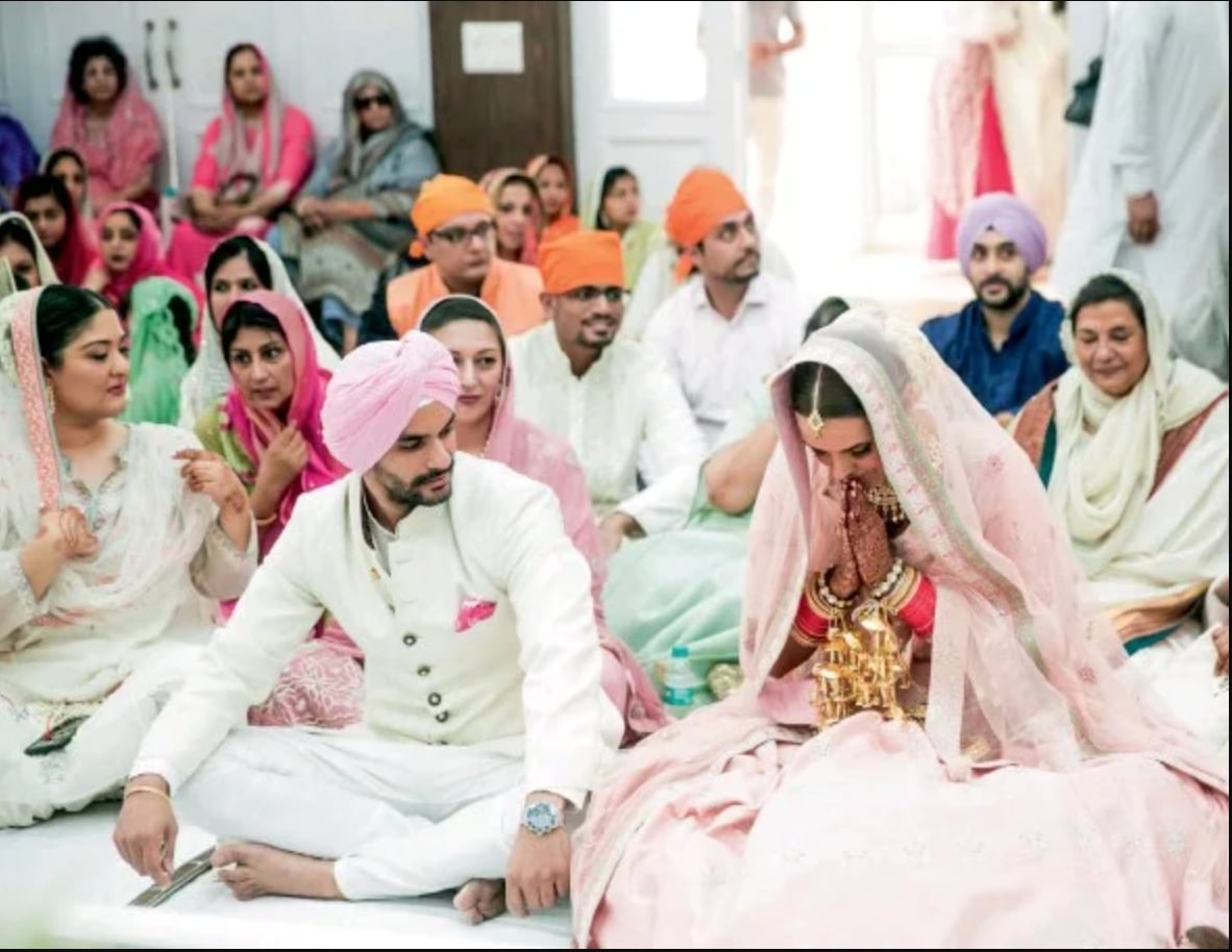 Angad Bedi and Neha Dhupia at their wedding.