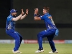 Daniel Sams of Mumbai Indians celebrates with team captain Rohit Sharma (PTI) Daniel Sams of Mumbai Indians celebrates with team captain Rohit Sharma (PTI)