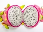 Dragon fruit or strawberry pear, also known as Kamalam in India, is a sweet, juicy fruit with white or red flesh dotted with black seeds Dragon fruit or strawberry pear, also known as Kamalam in India, is a sweet, juicy fruit with white or red flesh dotted with black seeds
