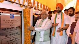 Haryana Chief Minister Manohar Lal Khattar and Sports Minister Sandeep Singh inaugurating a power substation on Wednesday.  (HT Photo)