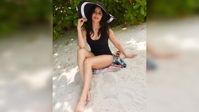 Katrina Kaif flaunts her flawless skin and long toned legs in this basic solid black beachwear. (Instagram/@katrinakaif) Katrina Kaif flaunts her flawless skin and long toned legs in this basic solid black beachwear. (Instagram/@katrinakaif)
