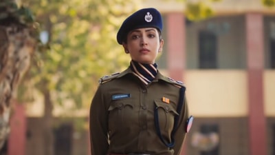 Yami Gautam in a still from Dasvi. The film also stars Abhishek Bachchan and Nimrat Kaur. Yami Gautam in a still from Dasvi. The film also stars Abhishek Bachchan and Nimrat Kaur.