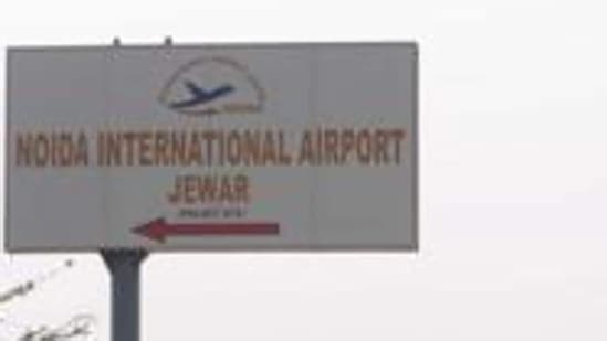  A signboard points towards the Noida International Jewar Airport, in Greater Noida.