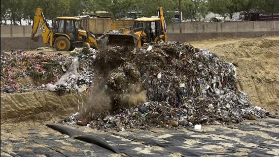 The site selected earlier for setting up the biogas plant was previously used as a landfill by the Noida authority. (HT archive)
