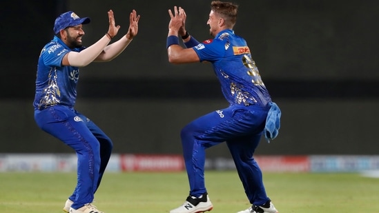 Daniel Sams of Mumbai Indians celebrates with team captain Rohit Sharma&nbsp;(PTI)