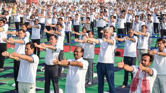 Lok Sabha Speaker Om Birla and Union Minister Sarbananda Sonowal participate in the 'Yoga Utsav' perform exercises at Red Fort. 