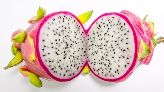 Dragon fruit or strawberry pear, also known as Kamalam in India, is a sweet, juicy fruit with white or red flesh dotted with black seeds(Pixabay)