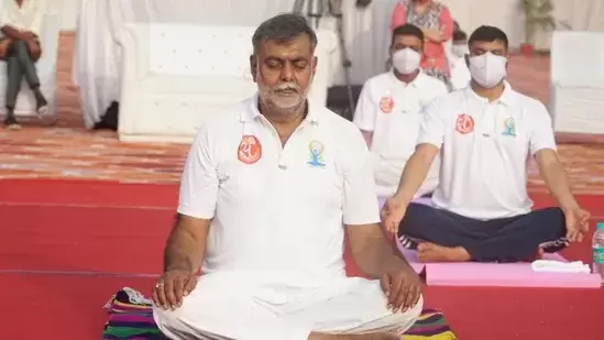 Union Minister of State for Culture and Tourism Prahlad Singh Patel performing yoga at Red Fort in Delhi&nbsp;