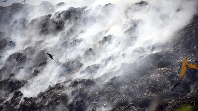 A fire broke out at the landfill on March 28 and continued for nearly three days, polluting the air in the neighbouring region and causing much public outrage. (Sakib Ali/HT)