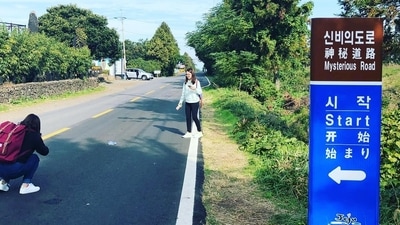 Jeju Mysterious Road (South Korea): Also known as the Dokkaebi Road, this street is located on the island on Jeju-do. This street is an optical illusion and will blow your mind. It slope goes downhill but appears the other way around due to its high surroundings. (Instagram/@stay_in_jeju) Jeju Mysterious Road (South Korea): Also known as the Dokkaebi Road, this street is located on the island on Jeju-do. This street is an optical illusion and will blow your mind. It slope goes downhill but appears the other way around due to its high surroundings. (Instagram/@stay_in_jeju)