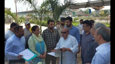 AAP MLA Gurpreet Gogi, along with MC and forest department officials, at the Sidhwan Waterfront Project (Phase 1) in Sarabha Nagar in Ludhiana on Friday. (Gurpreet Singh/HT)