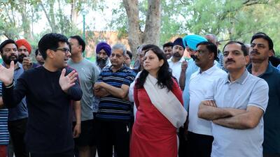 The Chandigarh MC commissioner was accompanied by area councillor Saurav Joshi, all superintending engineers and concerned executive engineers, junior engineers of the municipal corporation, office bearers of Resident Welfare Associations and local residents. (HT Photo) The Chandigarh MC commissioner was accompanied by area councillor Saurav Joshi, all superintending engineers and concerned executive engineers, junior engineers of the municipal corporation, office bearers of Resident Welfare Associations and local residents. (HT Photo)