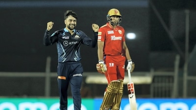 Mumbai: Rashid Khan of Gujarat Titans celebrates a wicket during T20 cricket match 16 of the Indian Premier League 2022 (IPL season 15) between the Punjab Kings and the Gujarat Titans held at the Brabourne Stadium (CCI) in Mumbai, Friday, April 8, 2022. (Sportzpics for IPL/PTI Photo)(PTI04_08_2022_000199B) (PTI)