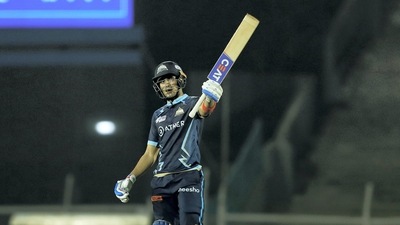 Mumbai: Shubman Gill of Gujarat Titans celebrates his half century during T20 cricket match 16 of the Indian Premier League 2022 (IPL season 15) between the Punjab Kings and the Gujarat Titans, at the Brabourne Stadium (CCI) in Mumbai, Friday, April 8, 2022. (Sportzpics for IPL/PTI Photo)(PTI04_08_2022_000220B) (PTI)