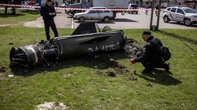 ldUkrainian police inspect the remains of a large rocket with the words "for our children" in Russian next to the main building of a train station in Kramatorsk, eastern Ukraine, that was being used for civilian evacuations, that was hit by a rocket attack killing at least 35 people, on April 8, 2022. (Photo by FADEL SENNA / AFP) (AFP) ldUkrainian police inspect the remains of a large rocket with the words "for our children" in Russian next to the main building of a train station in Kramatorsk, eastern Ukraine, that was being used for civilian evacuations, that was hit by a rocket attack killing at least 35 people, on April 8, 2022. (Photo by FADEL SENNA / AFP) (AFP)