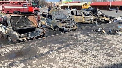 Burnt out vehicles are seen after a rocket attack on the railway station in the eastern city of Kramatorsk, in the Donbass region on April 8, 2022. (Photo by Herv� BAR / AFP) (AFP)