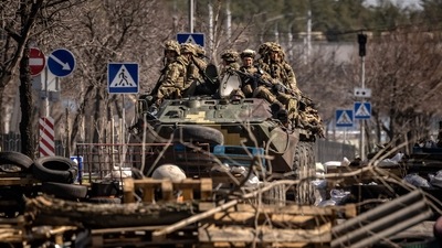 Ukrainian soldiers sit on a armoured military vehicule in the city of Severodonetsk, Donbass region. (AFP) Ukrainian soldiers sit on a armoured military vehicule in the city of Severodonetsk, Donbass region. (AFP)