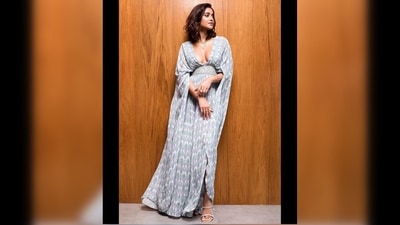 The plunging neckline accentuated her collarbone and she added a multi-layered necklace to fill up the space. (Instagram/@ileana_official) The plunging neckline accentuated her collarbone and she added a multi-layered necklace to fill up the space. (Instagram/@ileana_official)