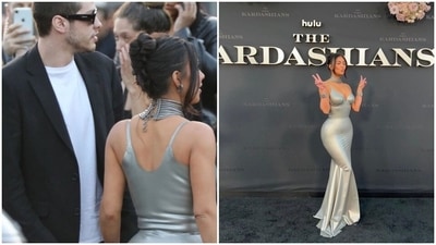 Kim Kardashian holds hands with boyfriend Pete Davidson; poses for photographs at the premiere of The Kardashians.