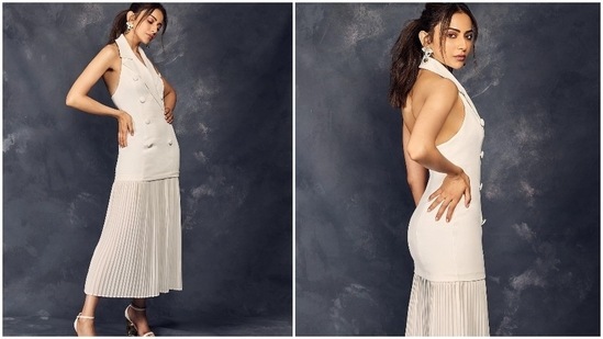 Rakul Preet earlier stepped out in a blazer inspired long halter top teamed with an ankle-length pleated skirt.(Instagram/@rakulpreet)