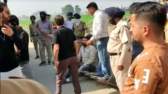 Residents protesting during Greater Ludhiana Area Development Authority action in Ludhiana area on Friday. (HT File)