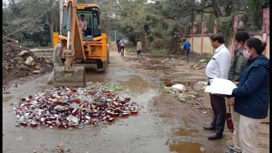 Seized liquor being destroyed in Patna. (HT Photo)