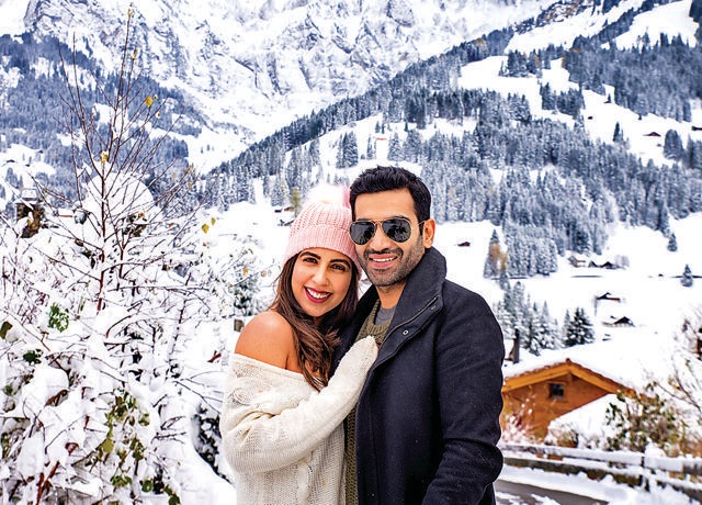 The couple drove to the Swiss Alpine villages in autumn The couple drove to the Swiss Alpine villages in autumn