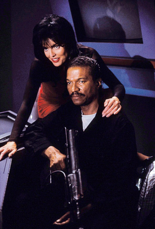 A character in a VR game is the primary threat in Alien Intruder. A character in a VR game is the primary threat in Alien Intruder.