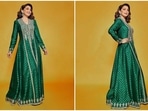 Madhuri Dixit's iconic green lehenga from the movie Hum Aapke Hain Kaun is still one of the most talked-about outfits of the 90s. The actor once again made fans hearts 'Dhak Dhak' with her recent look in an emerald green anarkali set by designer Anita Dongre.(Instagram/@anitadongre)