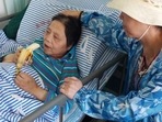 Shen Peiming, 71, eats a banana as a family member attends to her at a Shanghai hospital in 2019. Shen died on Sunday morning, (AP) Shen Peiming, 71, eats a banana as a family member attends to her at a Shanghai hospital in 2019. Shen died on Sunday morning, (AP)