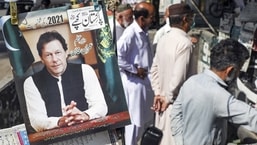 A portrait of Pakistan PM Imran Khan at a market in Islamabad.