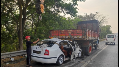 At least four people died on Saturday after a Skoda car rammed into a parked truck on the Pune-Mumbai expressway. (HT PHOTO)