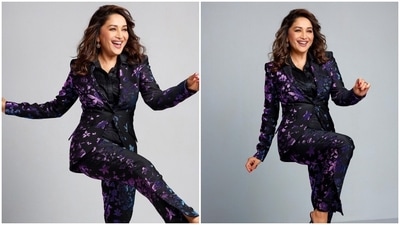 Madhuri Dixit stunned fans in this black and violet pantsuit. She wore her million dollar smile and left many mesmerised. (Instagram/@madhuridixitnene) Madhuri Dixit stunned fans in this black and violet pantsuit. She wore her million dollar smile and left many mesmerised. (Instagram/@madhuridixitnene)
