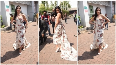 Nora Fatehi another set of photos clicked by the paparazzi, the Moroccan beauty was seen welcoming spring in a mesmerising off-white floral strapless bodycon dress with an attached train. (HT Photo/Varinder Chawla) Nora Fatehi another set of photos clicked by the paparazzi, the Moroccan beauty was seen welcoming spring in a mesmerising off-white floral strapless bodycon dress with an attached train. (HT Photo/Varinder Chawla)