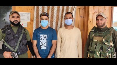 The accused in Srinagar police custody on Saturday. (SRINAGAR POLICE TWITTER PAGE)