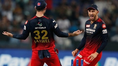 Royal Challengers Bangalore's Glenn Maxwell and Faf du Plessis celebrate a dismissal during the TATA IPL 2022 match between Mumbai Indians and Royal Challengers Bangalore (Royal Challengers Bangalore Twitter) Royal Challengers Bangalore's Glenn Maxwell and Faf du Plessis celebrate a dismissal during the TATA IPL 2022 match between Mumbai Indians and Royal Challengers Bangalore (Royal Challengers Bangalore Twitter)