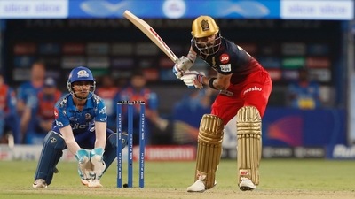 Royal Challengers Bangalore's Virat Kohli hits a shot during the TATA IPL 2022 match against Mumbai Indians, at MCA Stadium (@IPL Twitter) Royal Challengers Bangalore's Virat Kohli hits a shot during the TATA IPL 2022 match against Mumbai Indians, at MCA Stadium (@IPL Twitter)