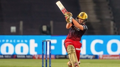 Royal Challengers Bangalore's Anuj Rawat hits a shot during the TATA IPL 2022 match against Mumbai Indians, at MCA Stadium ( @IPL Twitter) Royal Challengers Bangalore's Anuj Rawat hits a shot during the TATA IPL 2022 match against Mumbai Indians, at MCA Stadium ( @IPL Twitter)