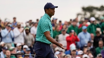 Tiger Woods watches his putt on the 18th hole during the second round at the Masters golf tournament (AP) Tiger Woods watches his putt on the 18th hole during the second round at the Masters golf tournament (AP)