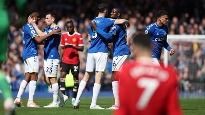 Everton's Abdoulaye Doucoure celebrates with Michael Keane, Seamus Coleman and Alex Iwobi after the match. (REUTERS)