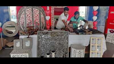 The stall with wooden carving products from Sharanpur, Uttar Pradesh, has been set up at Chandigarh Railway Station as part of Indian Railways’ ‘One Station One Product’ project. (HT Photo)